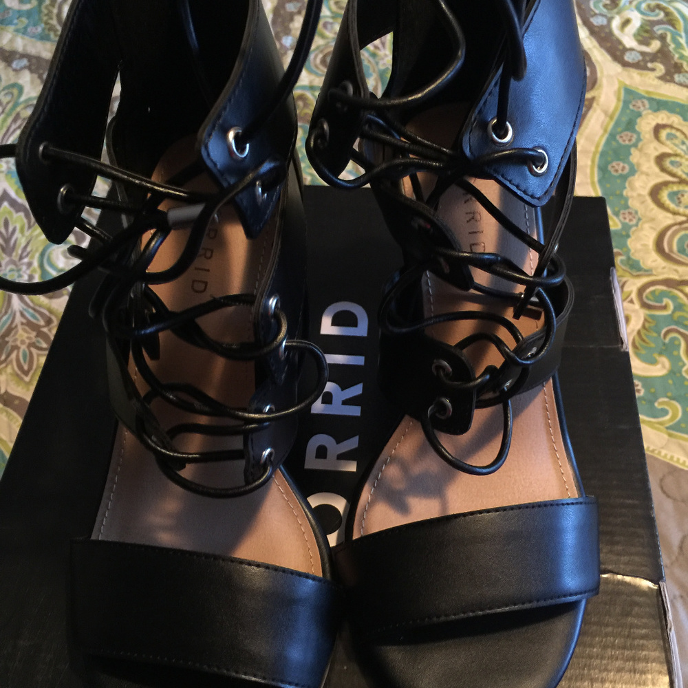Torrid Black Eyelet Caged Platform Heels